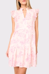 Woman modeling Flutter Sleeve Decked Out Day Dress in Pink floral toile print styled for everyday